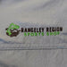 rangeley region Sport shop name and jumping fish logo on blue fabric