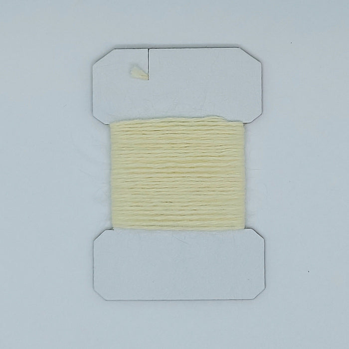 a card of light yellow "cream" soft yarn