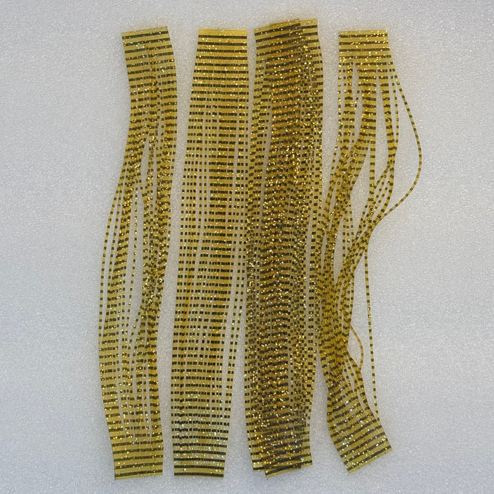 Four strips of Amber colored perfectly barred sili legs