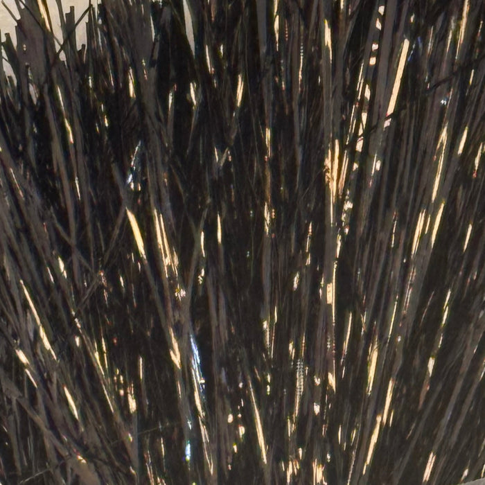 Black colored tinsel flash strands close up