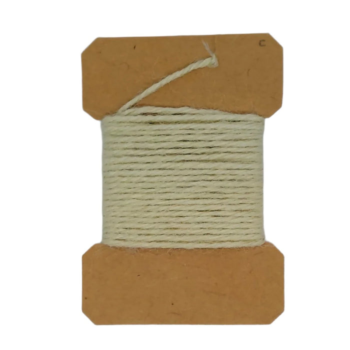 a card of cream Sparkle yarn for fly tying