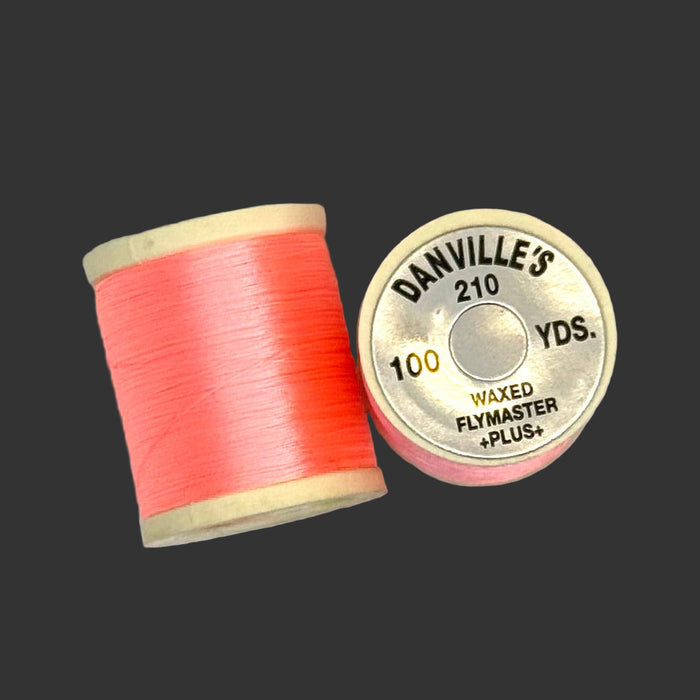 Fluorescent Shrimp Pink spool of thread from top and side view