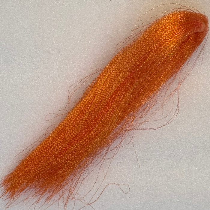 Fluorescent Fire Orange/Pearl colored midge flash strand bundle