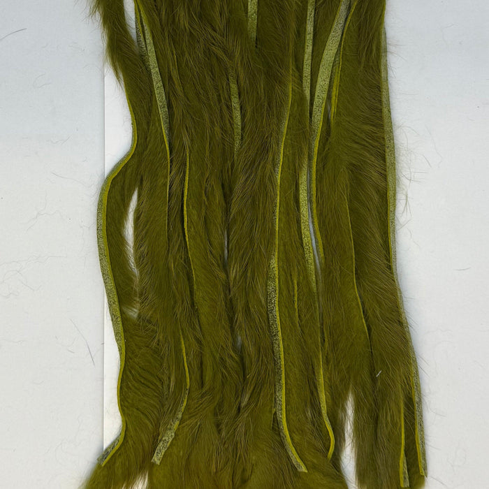 Close up of Olive strips of rabbit fur