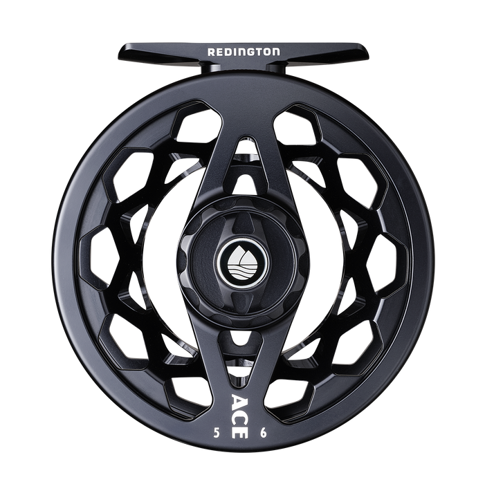 Redington Night Rider Reel with black and grey checkered background
