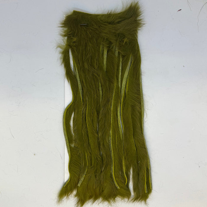 Full view of Olive covered rabbit fur strips