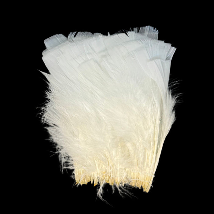 White bunch of flat turkey feathers