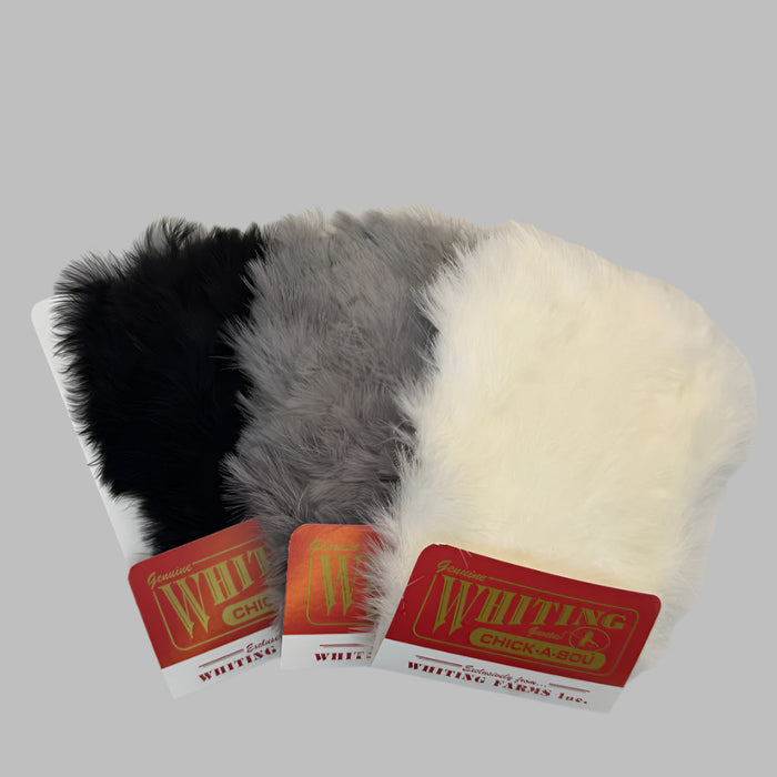 Three patches of black, grey and medium dun feathers in Whiting brand cards