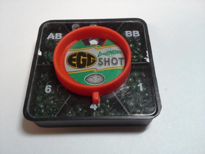 square shaped package of four sizes of Dinsmore lead free split shot used to help sink fly fishing flies