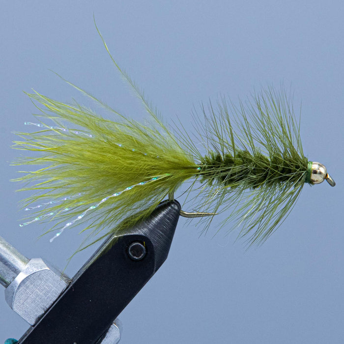 The classic beaded marabou tail Woolly Bugger fishing fly in olive from the Rangeley Region Sports Shop