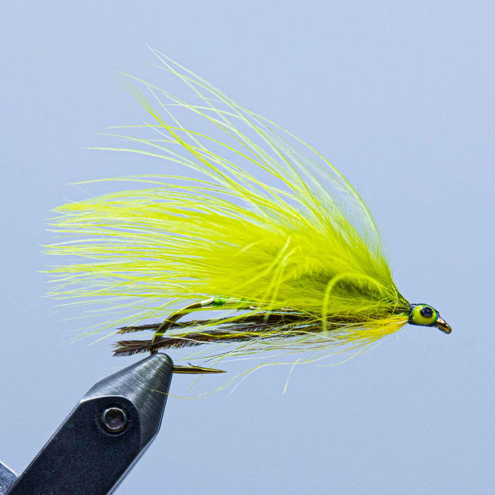 green and silver body, peacock under the shank and olive green marabou wing make up the green ghost streamer fly at a maine fly shop