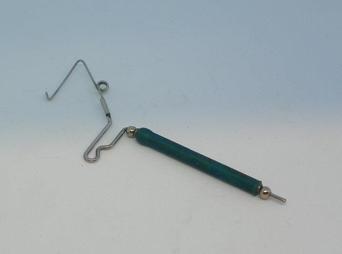 large whip finish tool with blue handle and spring