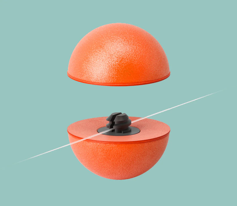an orange Oros indicator with the tippet inserted