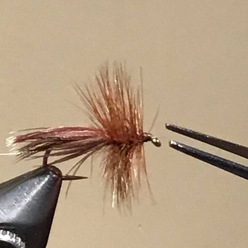 Making clean fly heads