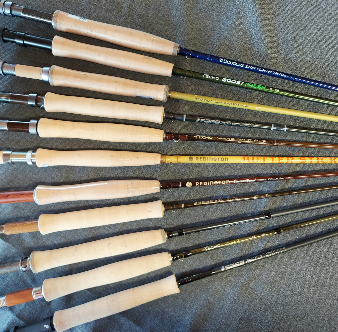 a grouping of some of the many fly rods at Rangeley Region Sport Shop