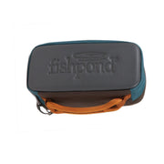 Ripple reel case front, teal and dark gray with embossed fishpond logo