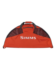 Simms Taco wader bag in orange, black trim, large front Simms logo