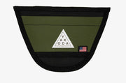 Yakoda net holder pouch with black trim and moss-green mesh, triangular logo patch and flag tag