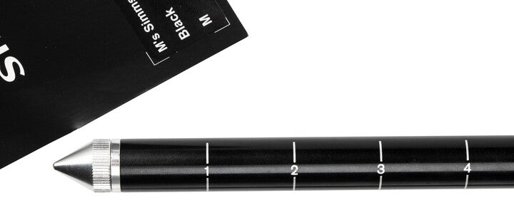 Telescoping wading staff tip and black section with numbered length markings