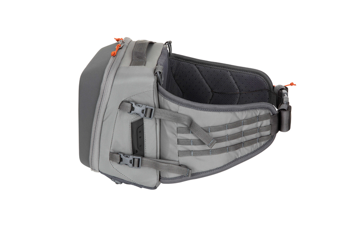 Simms hip pack side view, light gray body with interior mesh and zip pocket