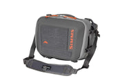 Simms hip pack, dark gray front pocket with SIMMS logo and adjustable strap