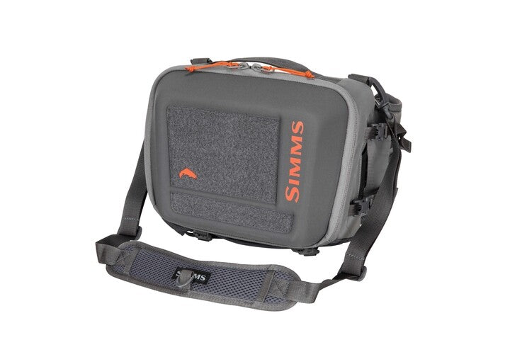 Simms hip pack, dark gray front pocket with SIMMS logo and adjustable strap