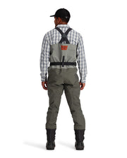 Simms Freestone stockingfoot waders, back view with X suspenders and gray legs