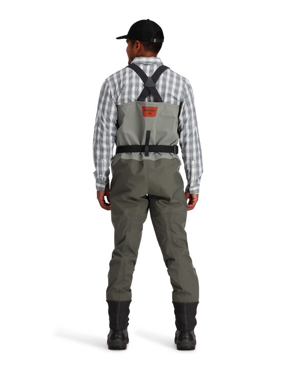 Simms Freestone stockingfoot waders, back view with X suspenders and gray legs