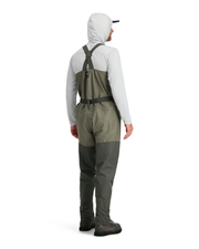 Stockingfoot wader in dark olive, shown from the back with shoulder straps