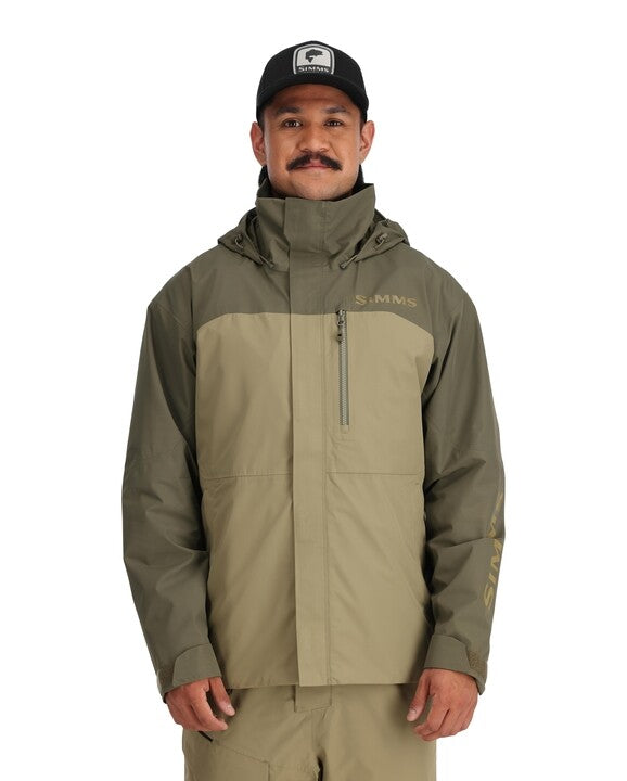 Simms Challenger jacket in olive, zip front, hood, worn with cap