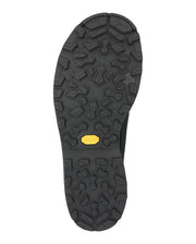 Boot sole with rugged dark tread pattern and small yellow grip label