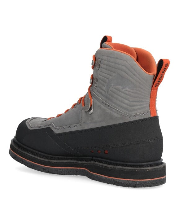 Simms G3 Guide wading boot with orange heel tab, slate-gray sides, black felt outsole