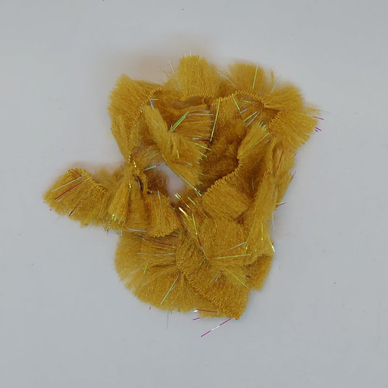 CCT body fur swatch in golden yellow with dense fuzzy fibers