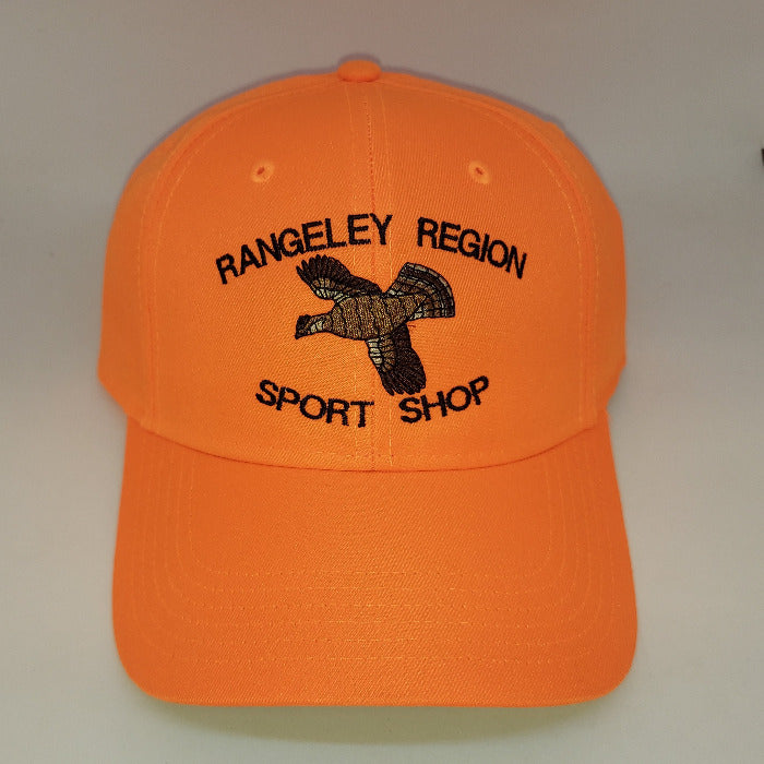 A blaze orange ball cap with embroidered flying grouse and shop name