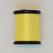 Yellow thread spool with black end caps