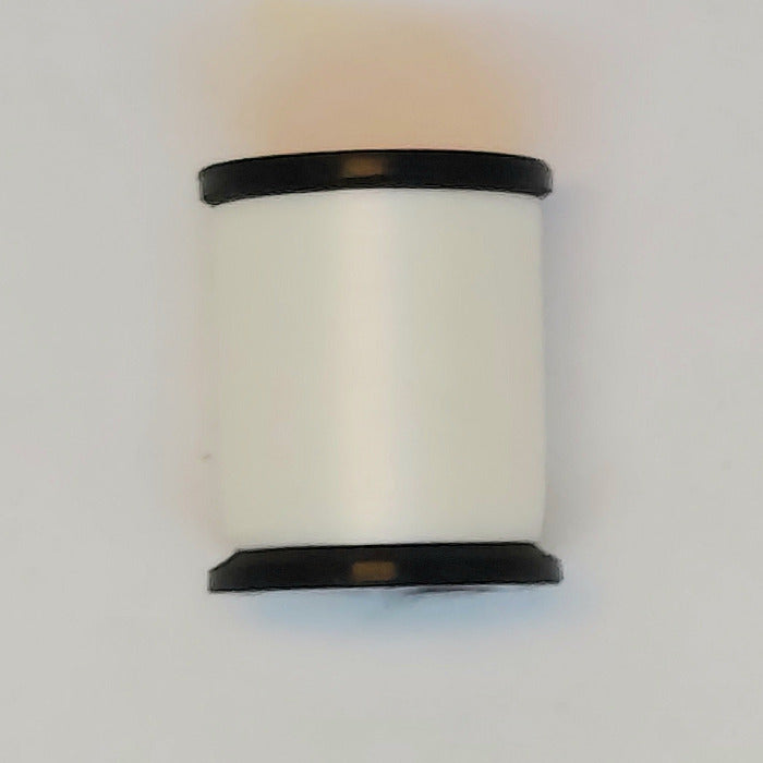 White thread spool with black caps