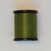 Olive green sewing thread spool with black ends
