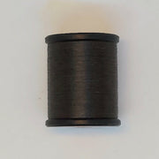 Dark gray thread spool with black end caps
