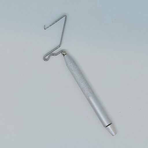 A Terra rotating whip finish tool with knurled handle