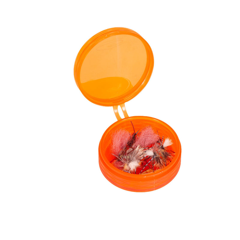 Fly puck container, orange translucent with clear lid open, showing assorted flies