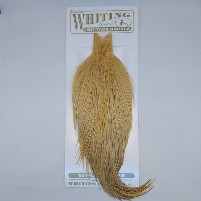 Light ginger saddle hackle feather, used for fly tying, in retail package