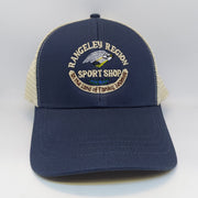 Blue logo trucker hat with white mesh side panels and embroidered front patch