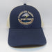 a cream and Navy trucker hat with the shop logo and name