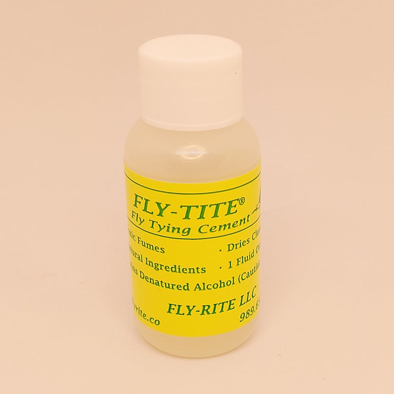 Fly-Tite head cement bottle with yellow and white label