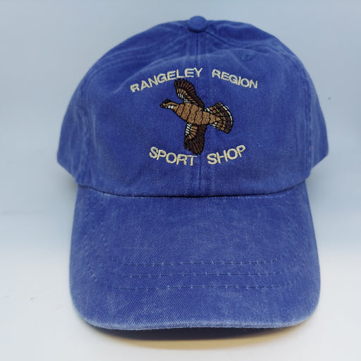 a blue hat embroidered with a flying grouseuse and the 