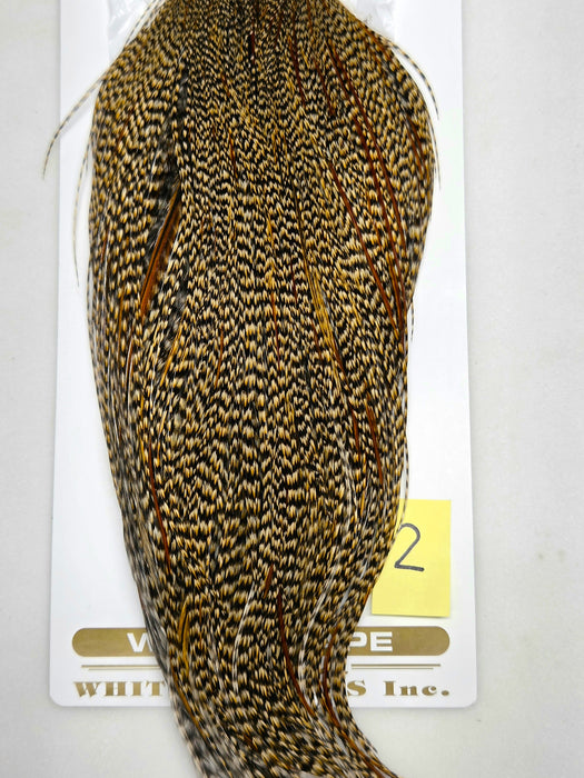 Gold and dark speckled hackle cape with long feather strands, pointed top.