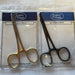 one black and one gold scissor pliers in packages