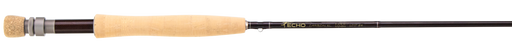 Fishing rod with black blank, cork handle, and visible line guides