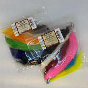 Assorted tail fiber bundles in clear bags: blue, black, green, orange, pink