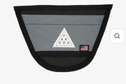 Yakoda net holder pouch with black trim and gray mesh, triangular logo patch and flag tag